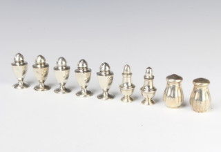 A collection of Edwardian and later silver condiments, 92 grams