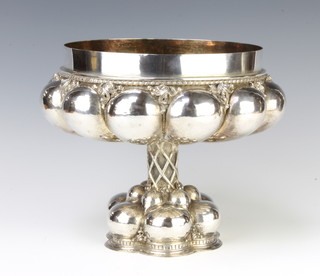 A Continental 925 standard repousse punch bowl, raised on a rustic stem, 1498 grams, 25cm 