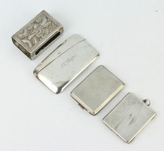 A silver card case Birmingham 1925, 2 match cases and a sleeve 170 grams