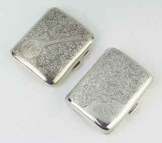 A silver chased cigarette case, Birmingham 1922 and 1 other, 120 grams 