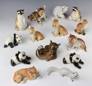 A Russian figure of a tiger cub 12cm and 13 other figures of animals 