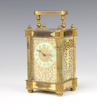 19th Century Continental carriage timepiece with enamelled dial and pierced gilt metal case 