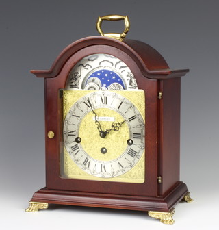 Franz Hermle, a German Georgian style chiming bracket clock, the 14cm arched dial with phases of the moon and marked H Samuel, contained in a mahogany case, the back plate marked 83 Franz Hermle 340-020  