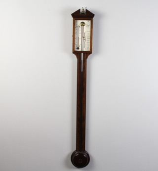 A Comitti and Sons of London, a Georgian style mercury stick barometer with silvered dial contained in an inlaid mahogany case 