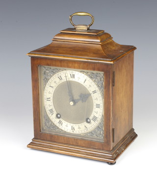 Garrard, a Queen Anne style striking bracket clock with gilt dial and silvered chapter ring contained in a walnut case 
