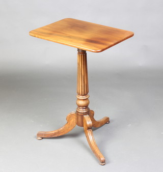 A rectangular Regency mahogany wine table, raised on a turned and fluted column with tripod base on bun feet, 73cm h x 51cm w x 38cm d 