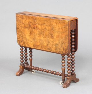 A Victorian figured walnut Sutherland table raised on bobbin turned supports 61cm x 61cm w x 13cm 