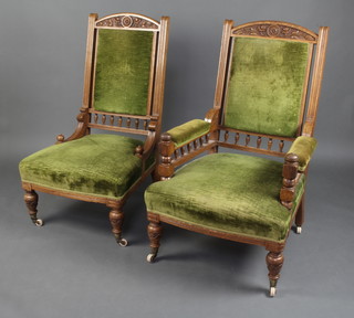 An Art Nouveau carved oak show frame armchair with bobbin turned decoration, the seat back upholstered in green material raised on turned supports together with a similar nursing chair 