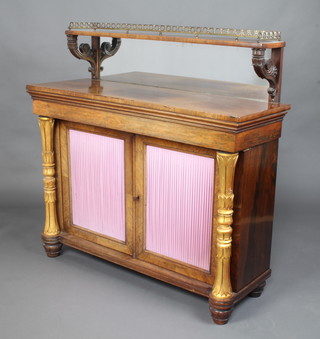 A Regency rosewood chiffonier with raised mirrored back and 3/4 gallery, the base fitted a cupboard enclosed by a pair of panelled doors and having gilt painted columns to the side 117cm h x 117cm w x 42cm d 
