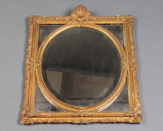 A 19th Century square plate wall mirror contained in a decorative gilt plaster frame 48cm x 41cm 
