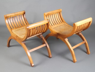 A pair of Georgian style X framed hardwood stools with woven rush seats 59cm h x 74cm w  37cm d 