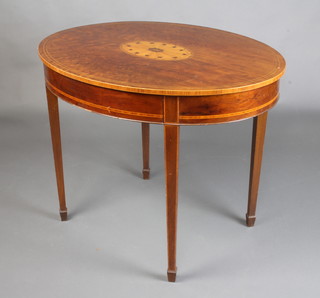 An Edwardian oval inlaid mahogany occasional table raised on square tapered supports, spade feet 71cm h x 94cm w x 73cm d 
