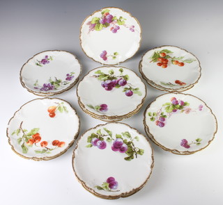 Sixteen Limoges dessert plates decorated with flowers 22cm