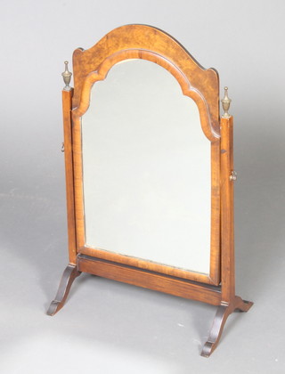 A 1930's Queen Anne style arch plate dressing table mirror contained in a mahogany and walnut swing frame 65cm h x 38cm w x 23cm d 