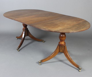 A Georgian style mahogany twin pillar  D end extending dining table, raised on twin pillar and tripod supports 70cm h x 92cm w x 137cm l x 180cm l when extended NB The clips for this table are held in the office.