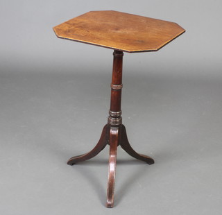 A Regency octagonal crossbanded mahogany wine table raised on pillar and tripod base 70cm h x 43cm w x 45cm d 