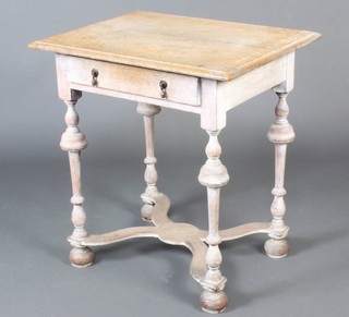 A 17th Century style limed oak side table fitted a drawer raised on cup and cover supports with X framed stretcher, raised on bun feet 70cm h x 64cm w x 51cm d 