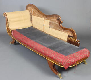 A William IV mahogany show frame chaise longue raised on outswept supports with brass caps and casters 90cm h x 215cm w  x 70cm d 