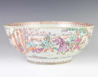 An 18th Century famille rose bowl decorated with panels of figures at pursuits, the interior with a spray of flowers 31.5cm 