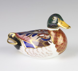 A Royal Crown Derby Imari pattern paperweight in the form of a duck with gold stopper 14cm 
