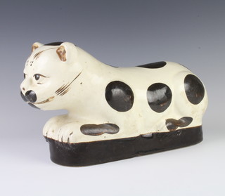 An antique style Chinese ceramic pillow in the form of a reclining cat 36cm 
