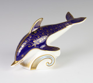A Royal Crown Derby Imari pattern paperweight in the form of a dolphin with silver stopper 17cm  