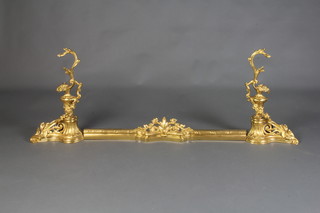 A French Rococo 19th Century style gilt metal fire curb incorporating 2 end urns 56cm h x 139cm w x 15cm d