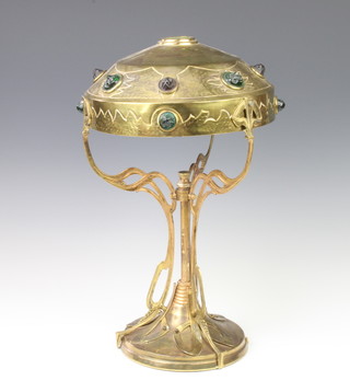 An Art Nouveau gilt metal and glass table lamp, the shade set cut glass roundels 37cm h x 24cm diam. 