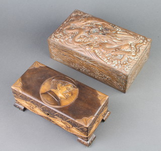 A Chinese antimony box the lid decorated a dragon with pearl 7cm x 23cm x 13cm together with a "Swiss" carved wooden musical trinket box with hinged lid decorated a portrait of a gentleman 8cm x 20cm x 9cm 
