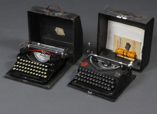 An Imperial Good Companion portable manual typewriter complete with instructions, boxed, together with an Underwood Standard 4 bank keyboard portable manual typewriter, both cased 
