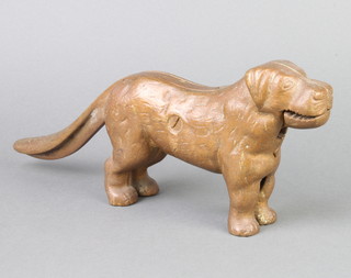 A pair of gilt metal nut crackers in the form of a standing Labrador 11cm h x 33cm l 