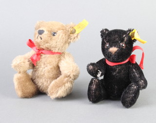 A black Steiff bear with articulated limbs 13cm, together with a brown ditto 15cm  