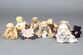 A Jo Greeno bear 31cm, a Cambrian brown bear with articulated limbs 33cm, a Greenwich collectable bear in brown 30cm, a Barton Creek Collection bear 36cm, a Cottage Collectable bear, 4 others 
