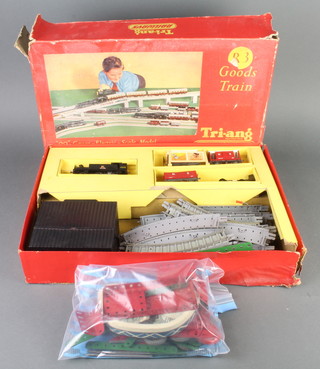 A Triang OO R3 train set boxed and a small quantity of various red and green Meccano 