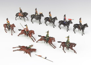 Three Britains figures of Hussars, 6 Britains figures of lancers (5 f) and a ditto mounted colonial officer 