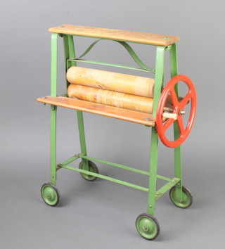 A child's Triang metal and wooden model mangle 
 