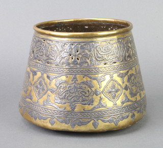 A Turkish brass and silvered pot of waisted form 14cm diam x  19cm h