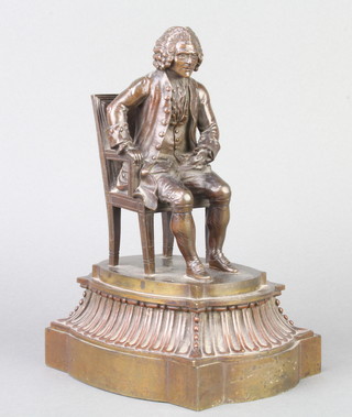 A bronze figure of a seated 18th Century gentleman with book, raised on a shaped base, unisgned 20cm h x 13cm w  16cm d 