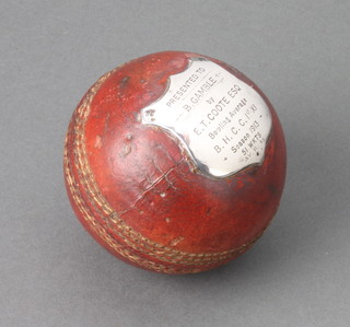A H Gradidge and Sons presentation cricket ball with silver plaque marked "Presented to B Gamble by E T Cote Esquire bowling average B.H.C.C. first eleven, season 1913, 51 wickets AV 11.45" 
