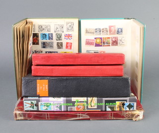 A stock book of mint and used GB and world stamps, Stanley Gibbons album of mint and used world stamps - Canada, France, an Ajax album of world stamps - New Zealand, Malaya, Malta, Italy, an Improved Postage stamp album of world stamps - GB, Germany, etc and 3 stock books of world stamps 