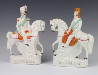 A pair of Victorian Staffordshire figures on horseback Campbell and Havelock 24cm 