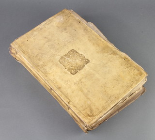 A Victorian parchment formed scrap book with Royal Arms, containing various monochrome prints 