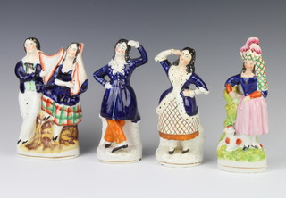A pair of Staffordshire dancing figures 18cm and 2 other Staffordshire figure groups  (1 group is chipped) 