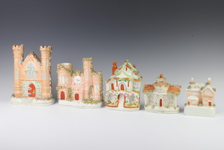 A Victorian Staffordshire spill vase in the form of a church 22cm, a ditto of a castle 18cm, a house 19cm, cottage 13cm and money bank 13cm 