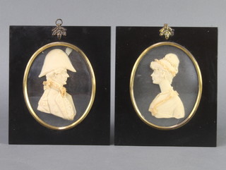 Lesley Ray, a pair of wax silhouettes of an 18th Century lady and gentleman, ovals, 12cm x 9.5cm contained in ebonised gilt metal mounted frames 