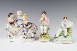 A Staffordshire figure of a man reading a book sitting on a rock 16cm, ditto of a boy eating porridge 18cm and a group of 3 children 20cm 