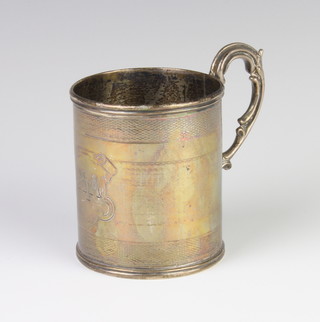 A Victorian engraved silver christening can with monogram and S scroll handle, London 1887, 8cm, 160 grams
