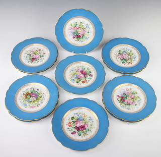 Eleven Continental porcelain dessert plates with blue and gilt borders enclosing spring flowers 21cm 