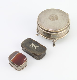 A circular silver engine turned trinket box Birmingham 1916, an agate mounted box and a horn snuff box 