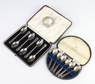 A set of 6 silver teaspoons Sheffield 1931, cased, a ditto set Sheffield 1942 and a napkin ring 140 grams 